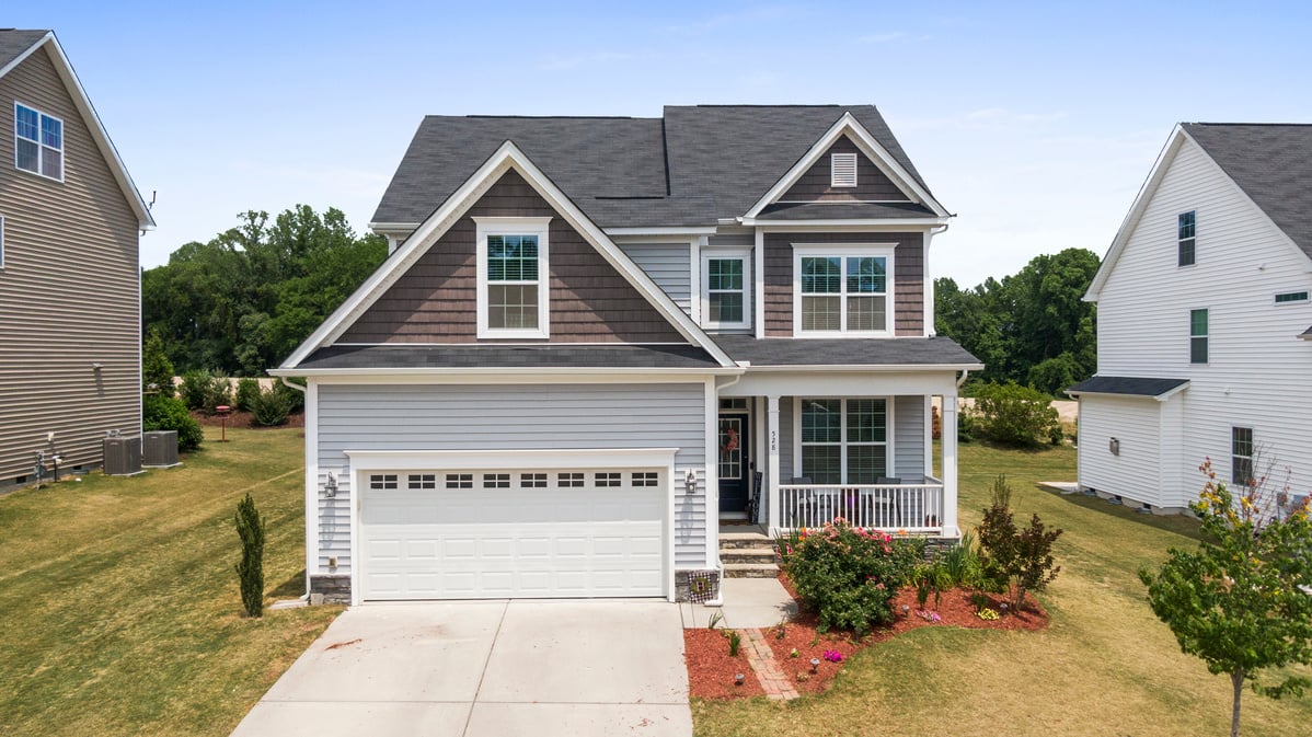 Driveway to a Garage by a House